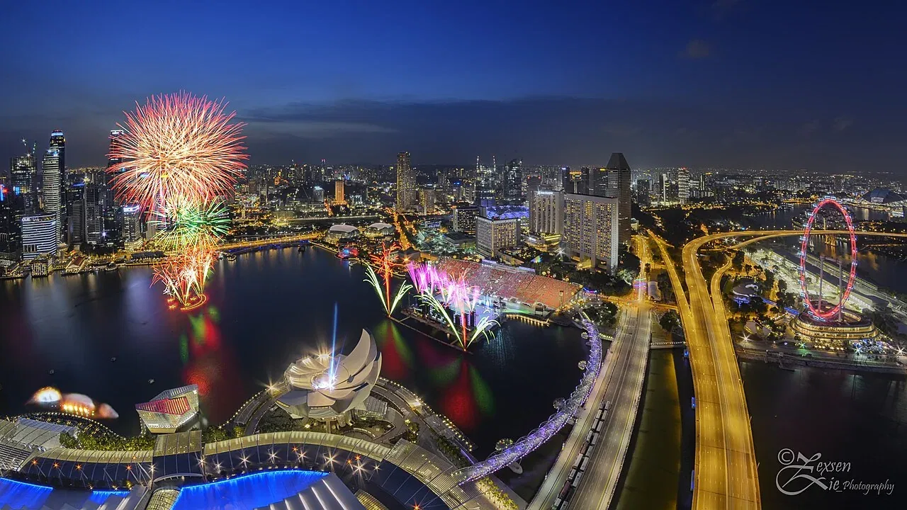 Fireworks bursting over the Marina Bay skyline during the Singapore National Day Parade rehearsal.
