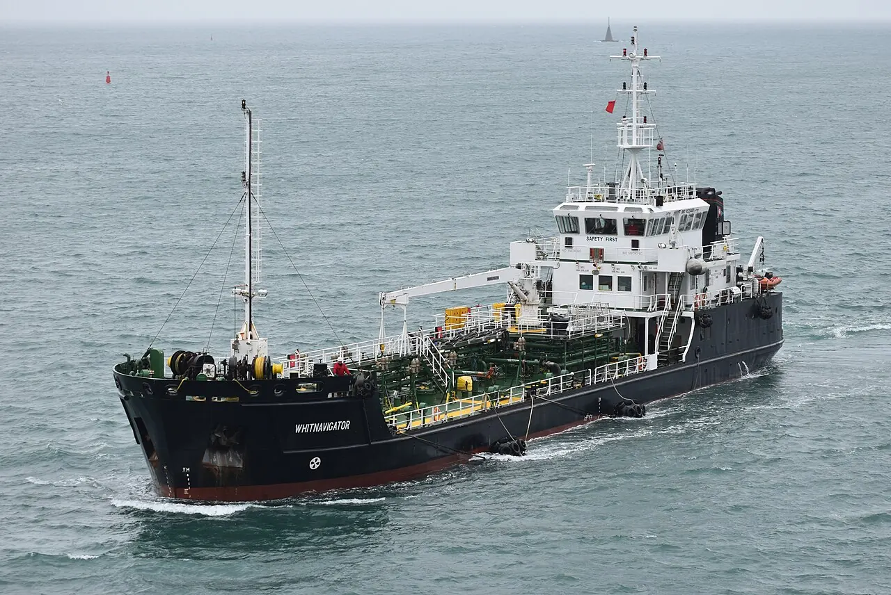The black bunker tanker Whitnavigator has many pipes across its open deck.