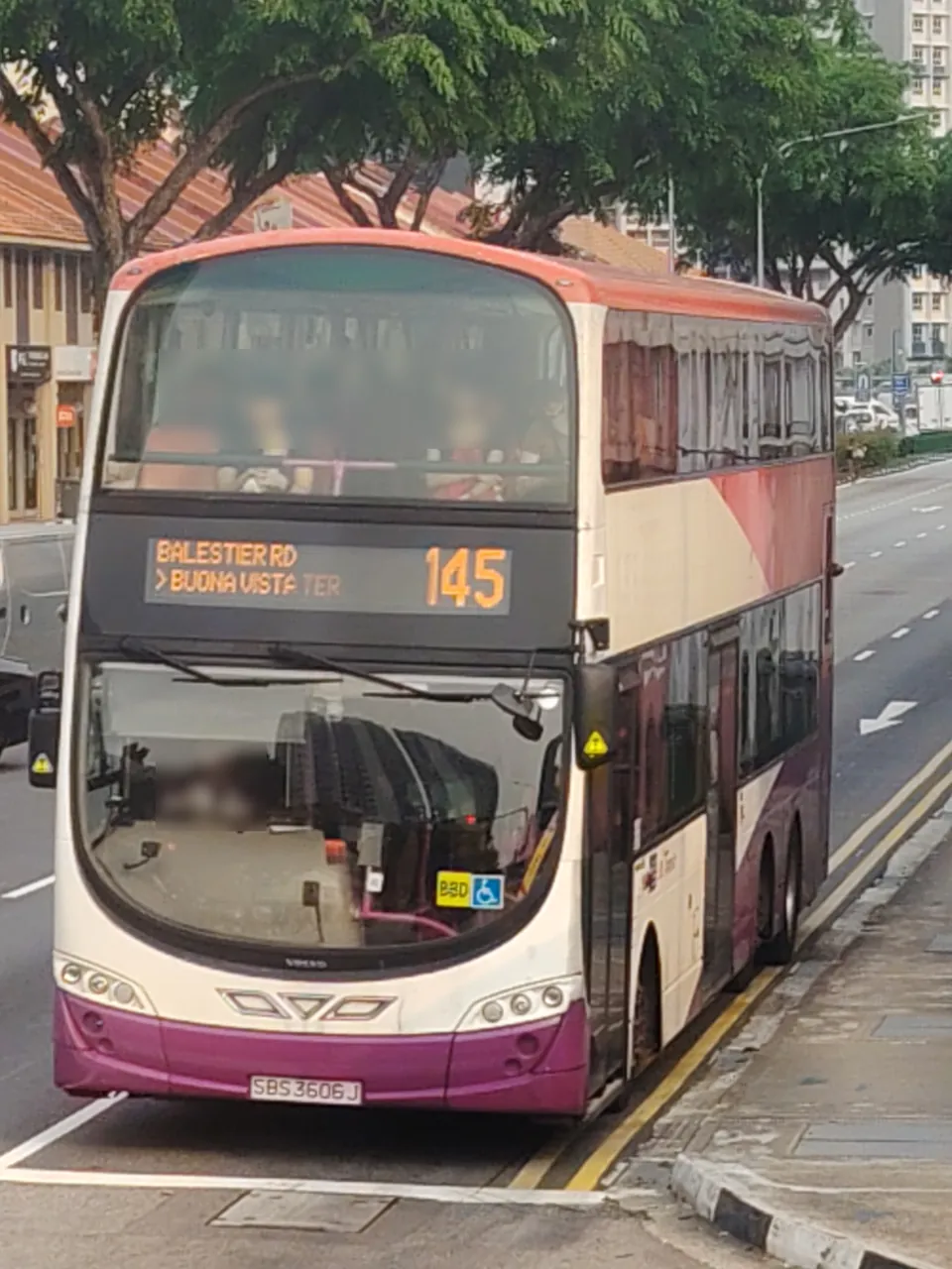 Double-decker bus — a double-decker bus showing 145 to Buona Vista on the front.