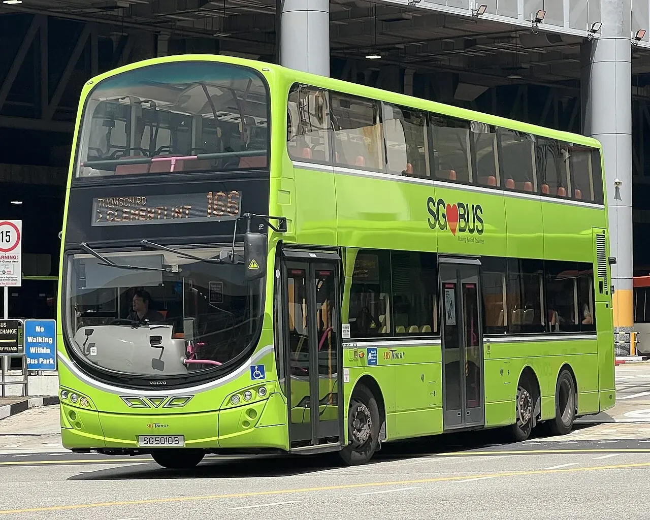 Green SG Bus double-decker on service 166 in Singapore.