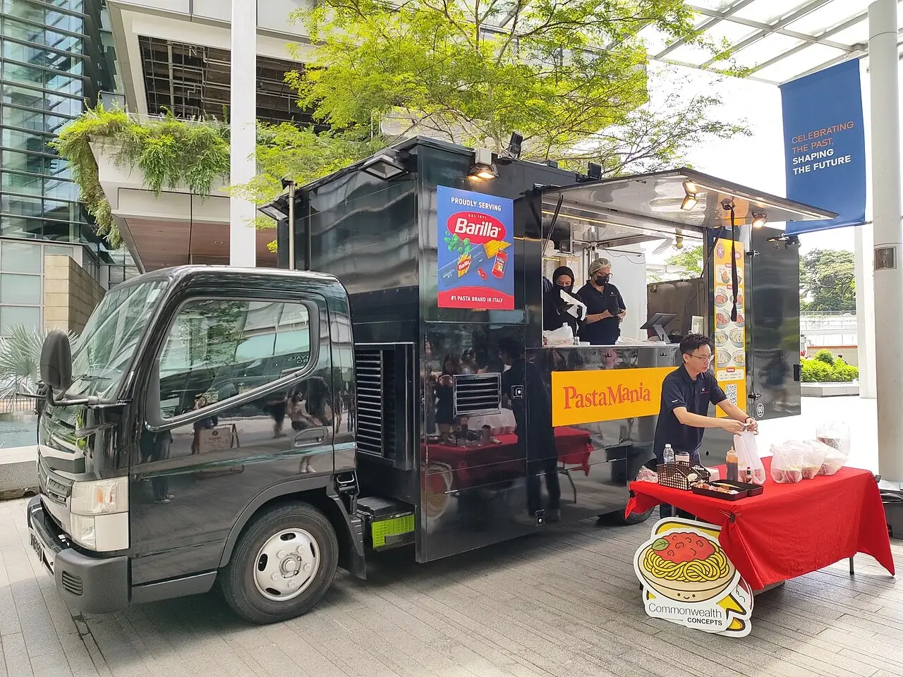 A food truck with an open serving counter at NUS University Town.
