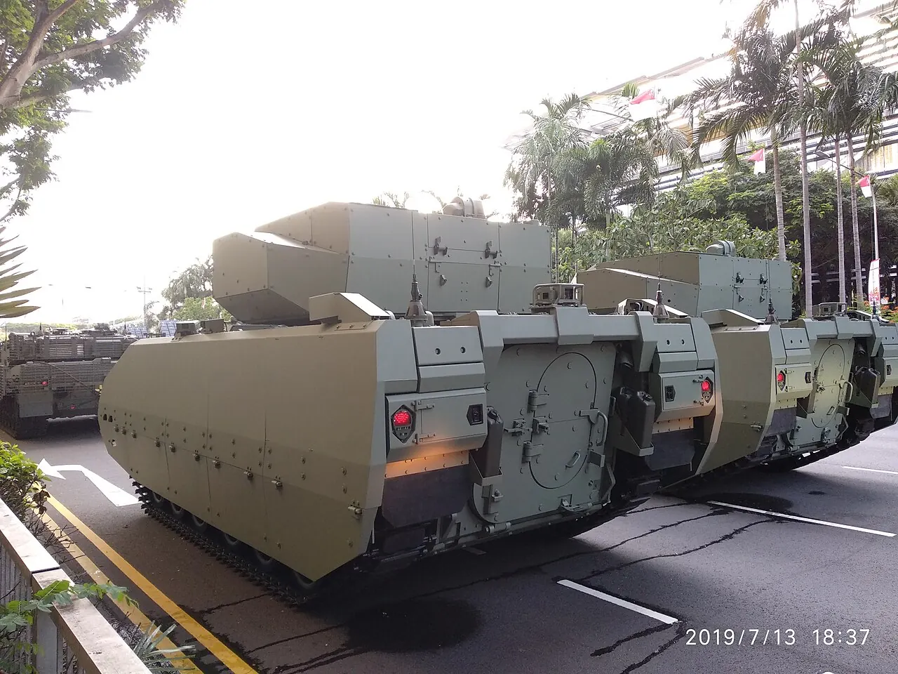 The rear of a Hunter armoured vehicle shows its wide body and tracks.