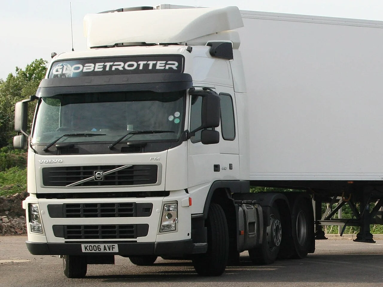 A white Volvo prime mover shown from the front and side.