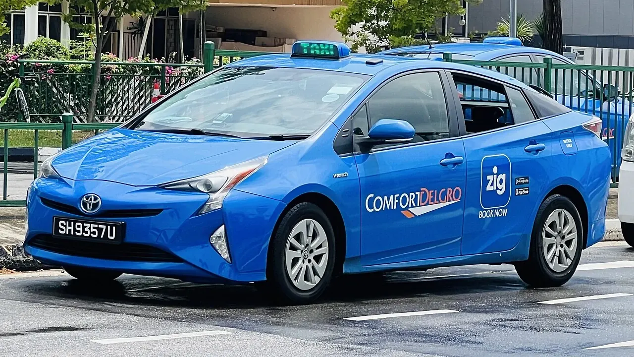 Blue ComfortDelGro taxi in Singapore.